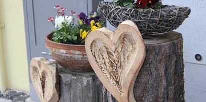 Flower pots and wooden hearts